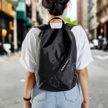 Load image into Gallery viewer, lightweight anti theft backpack small black riutbag crush for men and women 14 litre city day pack. All the zips are against your back so no one can access your valuables except you. Enjoy every journey with RiutBag Crush