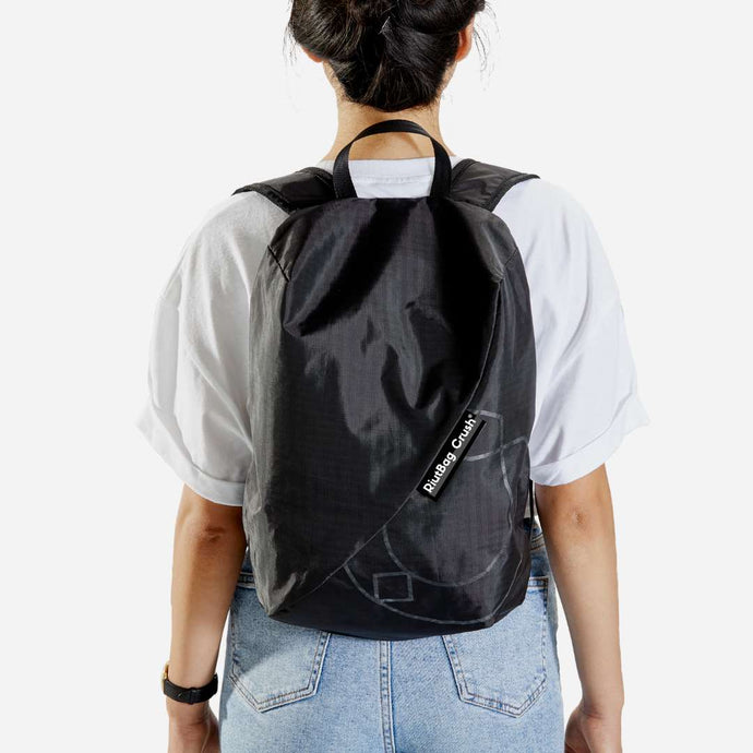 lightweight anti theft backpack small black riutbag crush for men and women 14 litre city day pack. All the zips are against your back so no one can access your valuables except you. Enjoy every journey with RiutBag Crush